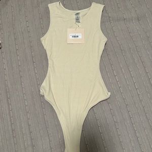 Kittenish body suit. Never worn.